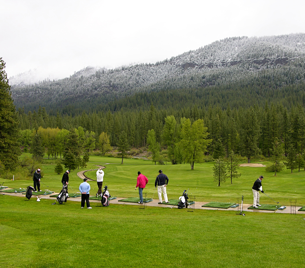 players at driving range
